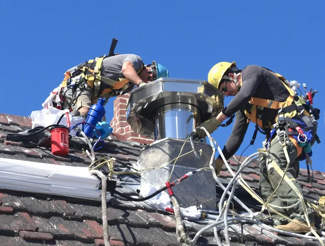 Protective chimney cap installed by Old Saybrook Chimney Sweep in Old Saybrook, CT